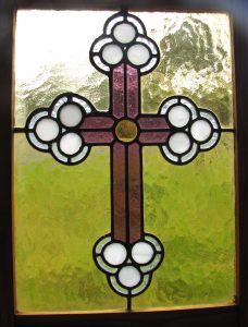 Leadlight stained glass Whangarei. Glass stained cross with yellow purple clear and white stained glass colours