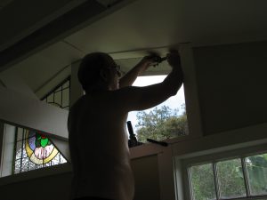 Leadlight stained glass Whangarei. Mishka Patterson at work installing leadlight stained glass